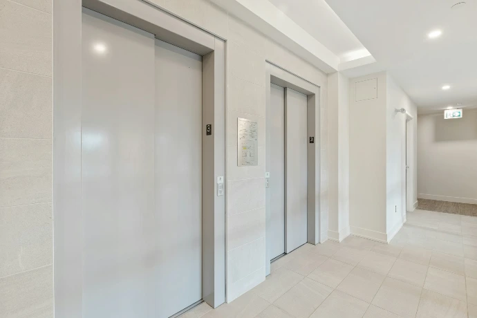white wooden door near white wall